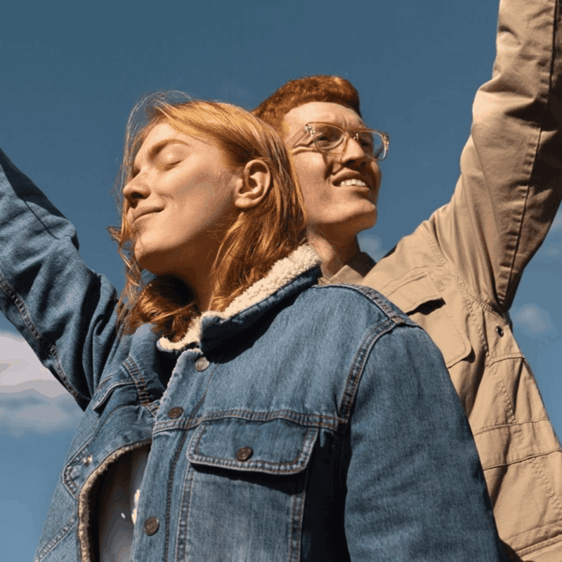 Two people outdoors representing patient-centered outcomes and quality of life enabled by full-service CRO clinical research solution at Excelya